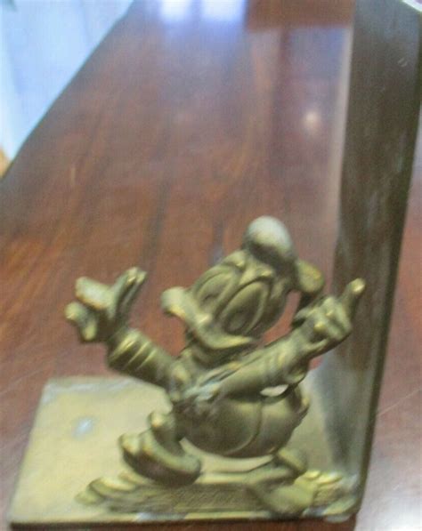 DONALD DUCK BRASS BOOK END WALT DISNEY PRODUCTIONS MB MILTON BRADLEY