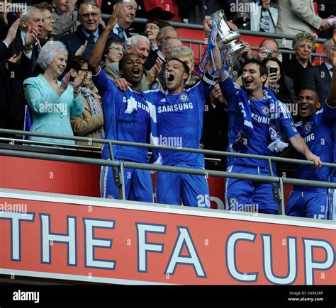 Chelseas Captain John Terry Second Left Lifts The Fa Cup With