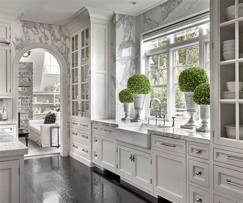 white kitchen design  marble countertops