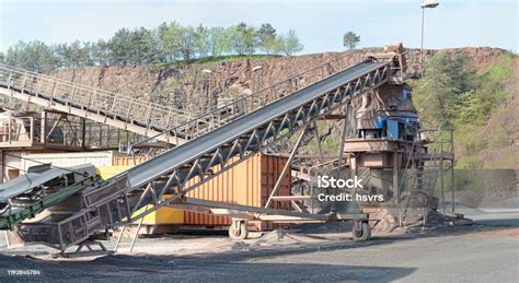 Conveyor Belt With Stone Crusher Machine In Quarry Stock Photo