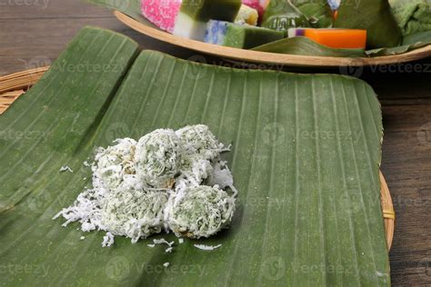 Sweet Rice Cake Balls Filled With Molten Palm Sugar And Coated In Grated Coconut Kuih Onde Onde