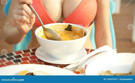 Prawn Spicy Soup Is A Thai Dish With Sour And Spicy Taste Busty Girl In A Bikini Eats Tom Yam