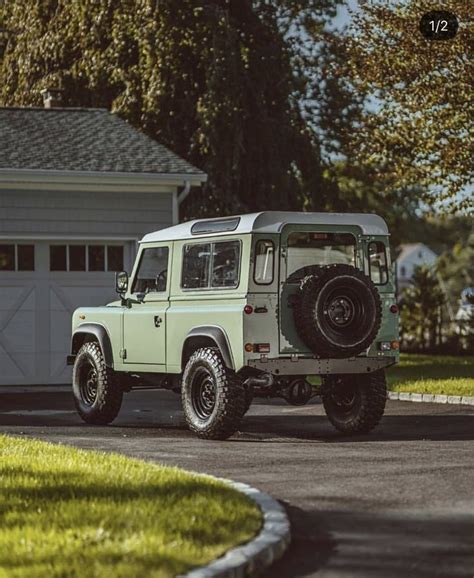 Land Rover Defender in Green and White