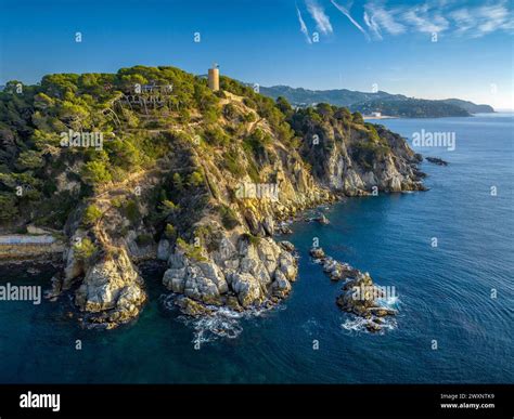 Punta De Fenals And The Castle Of Lloret De Mar On Top Of Some Cliffs