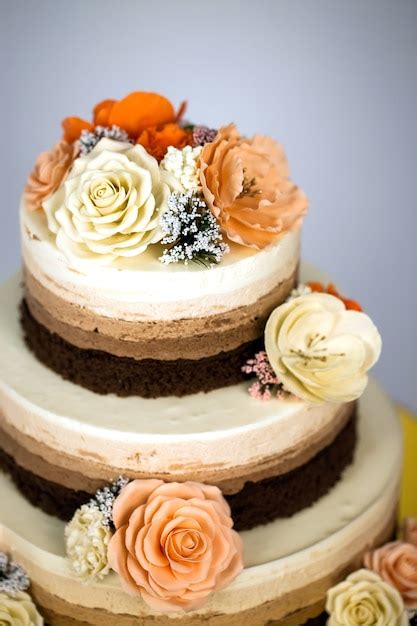 Premium Photo Naked Cake Wedding Rustic Cake With Flowers