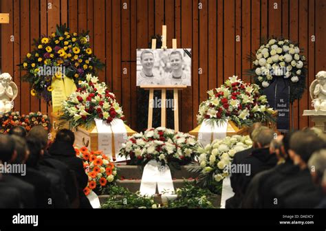 The Coffins Are Seen During The Funeral Service For The Twin Handball