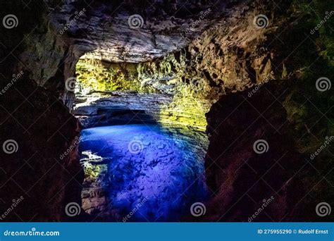 The Blue Water Of Poco Encantado Or Enchanted Well In A Cave At Itaete