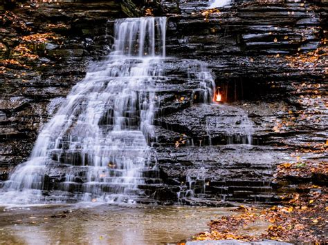 Native American Eternal Flame Behind New York Waterfall