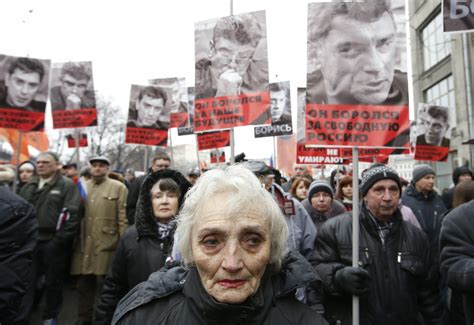 Thousands Of Russians March In Moscow In Memory Of Murdered Putin