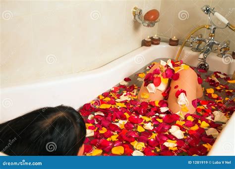 Woman In A Rose Petal Bath Royalty Free Stock Images Image 1281919