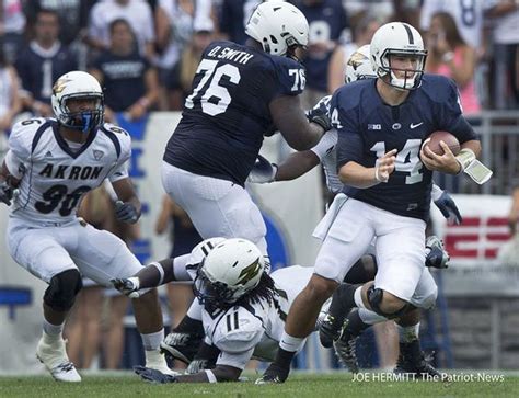 PENN STATE – FOOTBALL 2014 – Penn State quarterback Christian Hackenberg scrambles during the ...