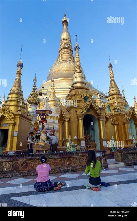 Myanmar Formerly Burma Yangon Rangoon Women Praying At Shwedagon Pagoda Buddhist Holy