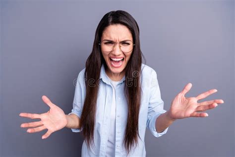 Photo Of Aggressive Angry Mature Woman Wear Formal Shirt Spectacles Rising Arms Isolated Grey