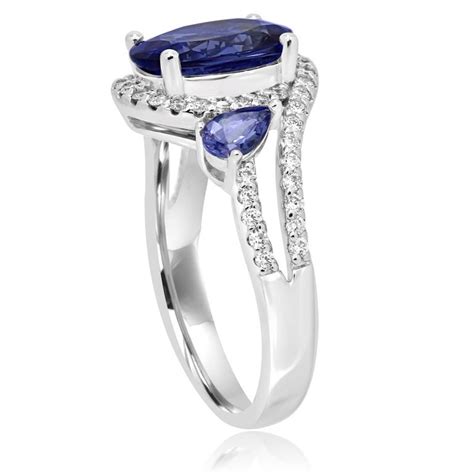 Tanzanite Oval Diamond Three Stone Gold Halo Ring At 1stdibs