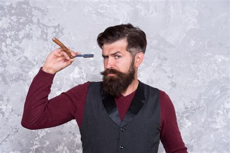 Premium Photo Hipster Shave Face With Blade Confident Man Beard