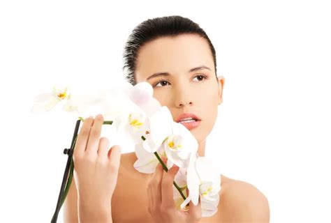 Nude Woman With A Twig Of Lily Flower Stock Photo By Piotr Marcinski