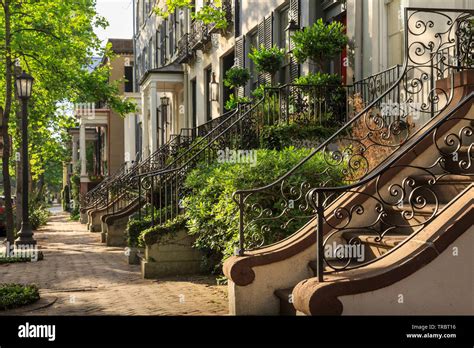 Historic District Street lined with Row Homes in Spring, Savannah, Georgia Stock Photo - Alamy