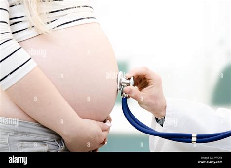 Doctor Examining Woman Stethoscope Hi Res Stock Photography And Images