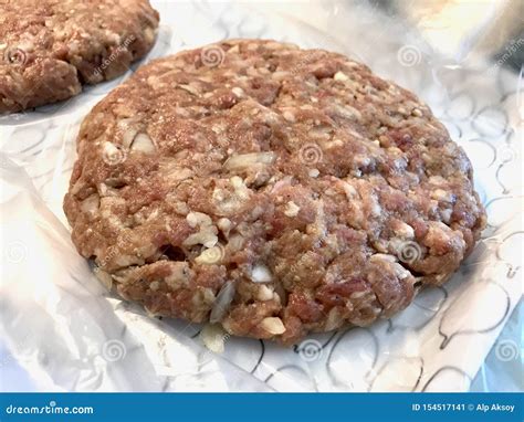 Raw Hamburger Patty Meat With Minced Meat Ready To Fry Stock Image