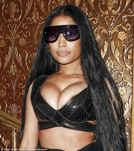 Busty Nicki Minaj Suffers A N Pple Slip In Snake Skin Bra At A Dinner