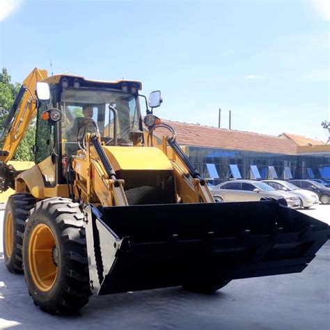 Compact Backhoe Loader With X Four Wheel Steering System And Crab