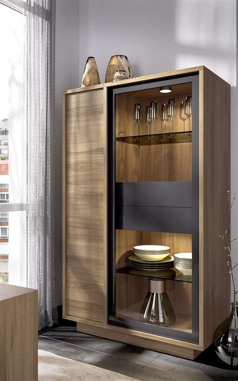 Modern Wooden Cabinet With Wine Glasses And Plates