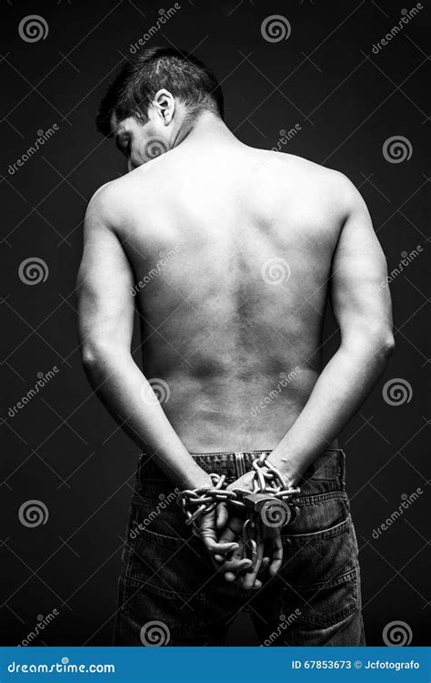 Slave Chained To Wall