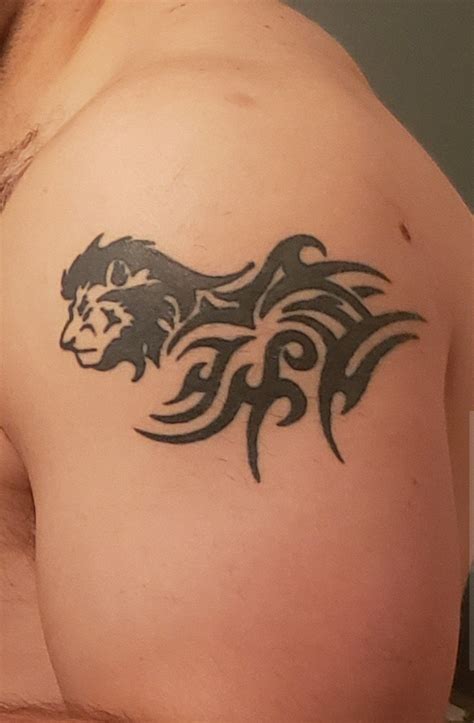 Tribal Lion Tattoo Designs For Men