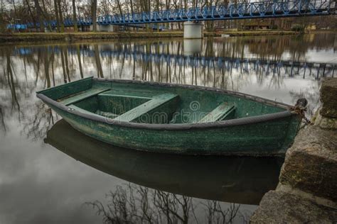 Small Wooden Green Boat on River Otava in Pisek City in Morning Stock Photo - Image of tower ...