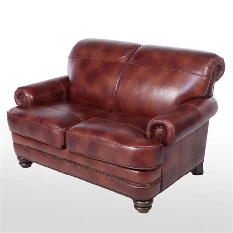 Flexsteel Leather-Upholstered and Brass-Tacked Loveseat | EBTH