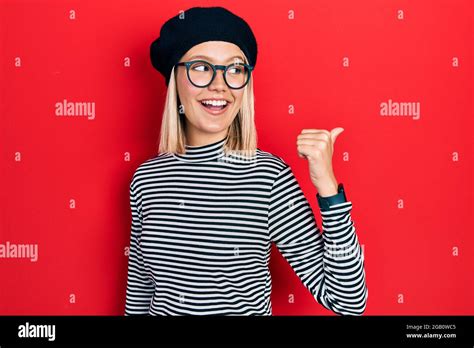 Beautiful Blonde Woman Wearing French Look With Beret An Glasses
