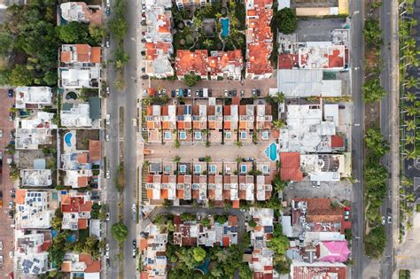 Aerial Top Down View Of Houses And Housing Complexes In Cancun Mexico