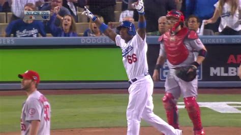 Yasiel Puig with bat flip for the ages on triple