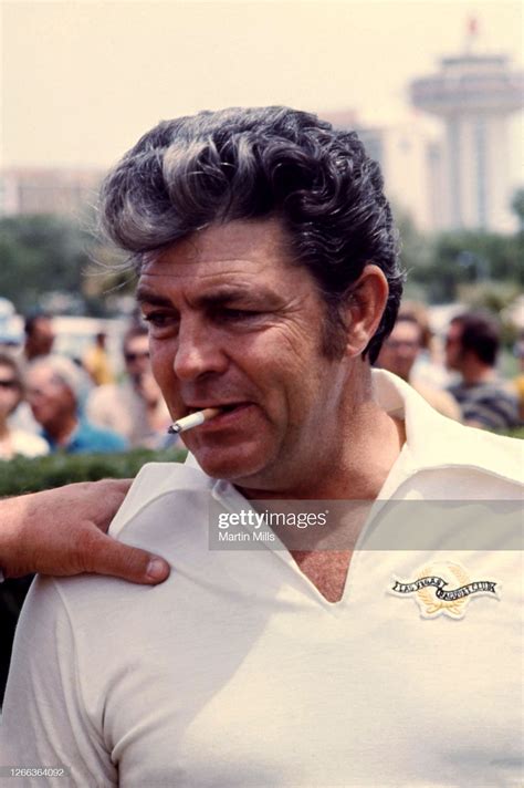 American Actor Dale Robertson Smokes A Cigarette Before Participating