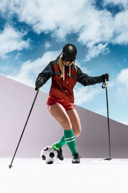 Free Photo | Full shot woman skiing and playing football