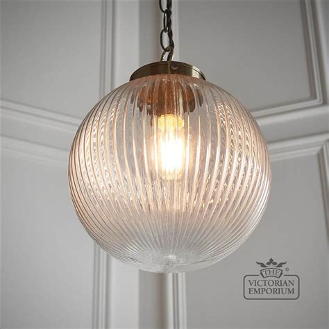 Ribbed Glass Globe Pendant With Antique Brass Metalwork