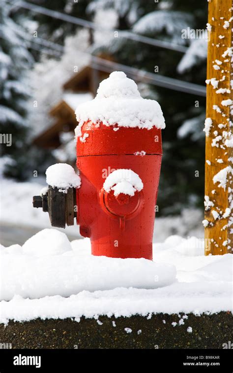 Snowy Red Fire Hydrant Stock Photo Alamy