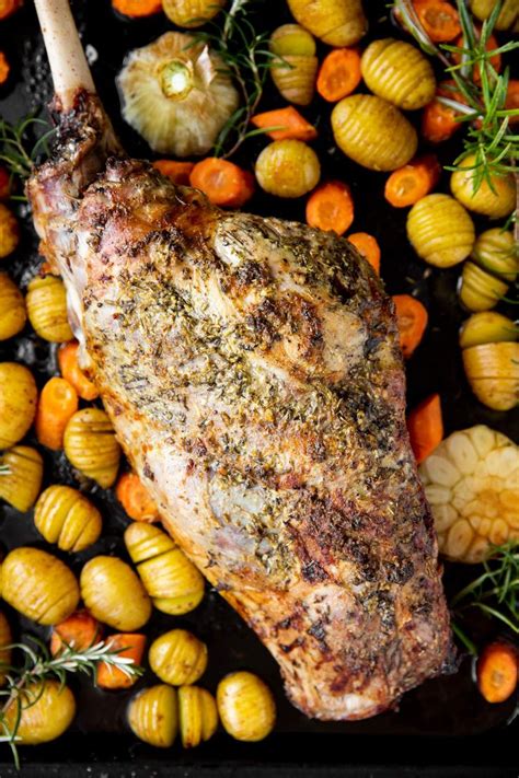 Roasting A Leg Of Lamb In The Oven Is So Easy Seasoned With A Garlic Herb Butter And Roasted