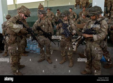 U S Troops Prepare Their Equipment Before A Squad Live Fire Exercise