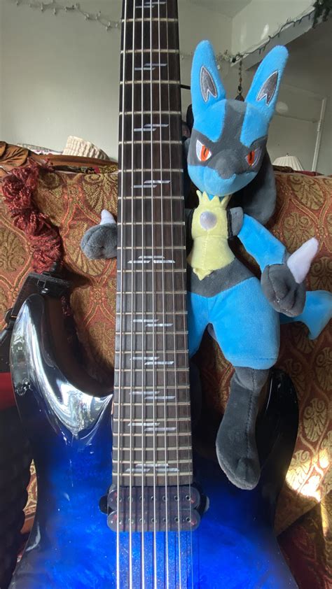 Playing Heavy Metal 🤘🏻🔥 : r/lucario