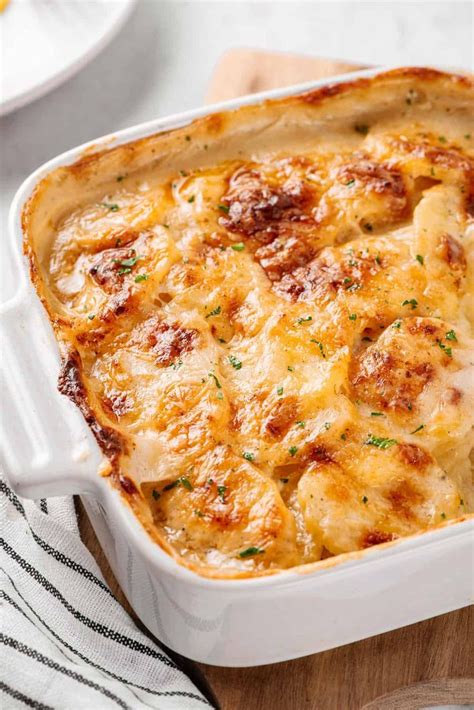 This Easy Potatoes Au Gratin Recipe Layers Thinly Sliced Potatoes With A Rich Creamy Cheese