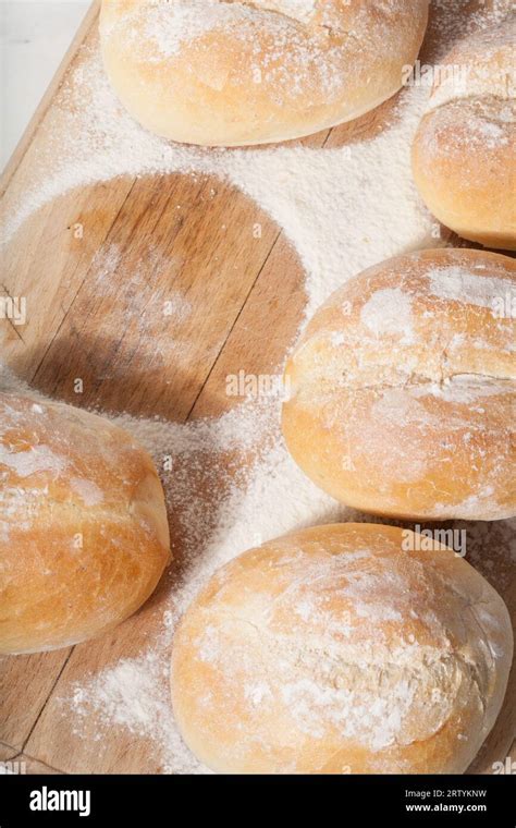 Fresh Baked Wheat Buns With Flour Stock Photo Alamy