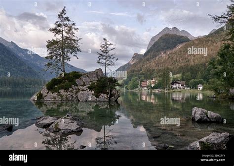 Mountain Landscape Around Lake Hintersee With Conifer Trees On Small