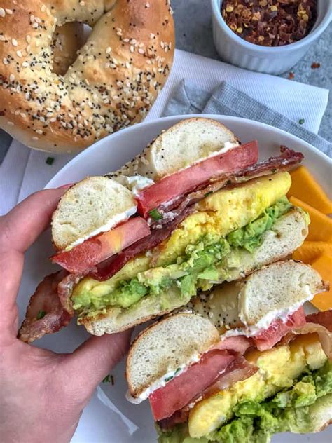 Bacon Egg And Avocado Breakfast Bagel With Peanut Butter On Top