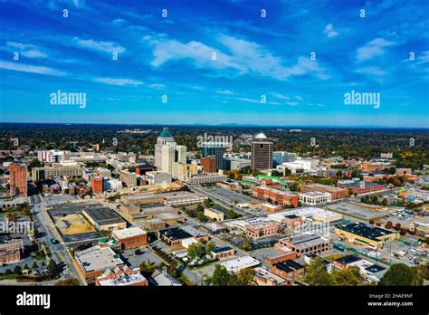 An Aerial View Of Greensboro Nc Skyline With Pilot Mountain Saurtown