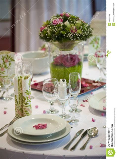 Dinner table with flowers stock photo. Image of glass - 14266598