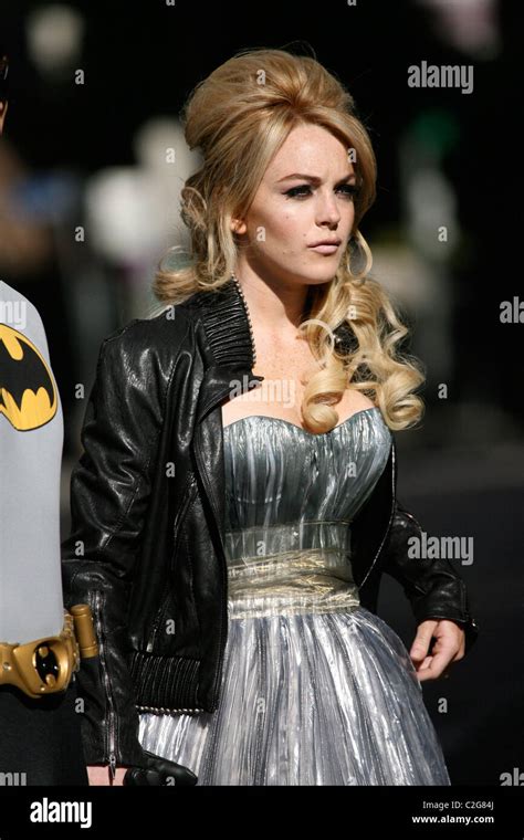 Lindsay Lohan Wearing A Silver Ballgown With Batman Lohans Heroes The Men In Lindsay Lohans