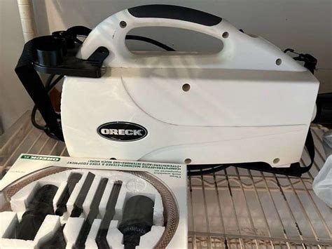 Oreck Handheld Vac W Attachments Curran Miller Auction And Realty Inc