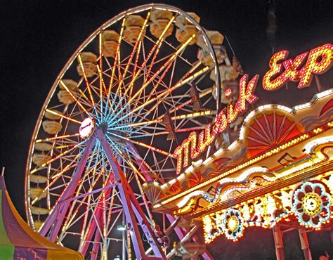 Ferris Wheel Yellow Carnival Booth In Foreground Creepy Carnival Circus Aesthetic Ferris Wheel