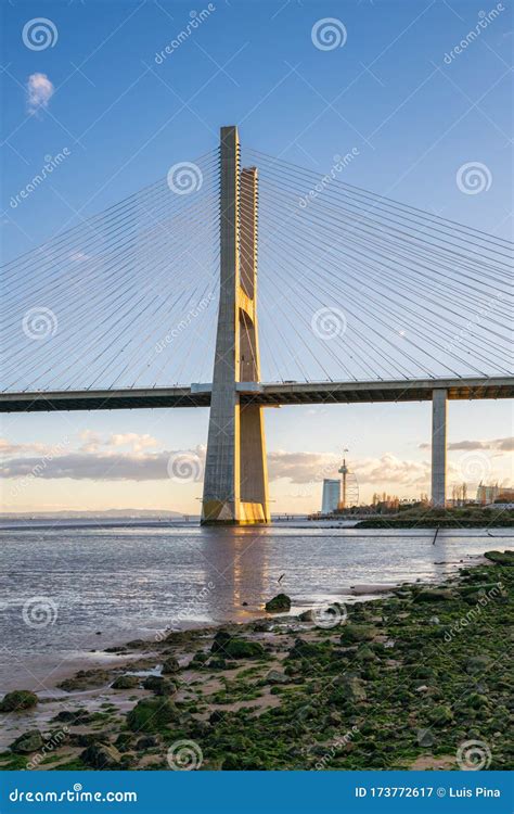 Ponte Vasco Da Gama Bridge View Near the Rio Tejo River at Sunset, Portugal Stock Image - Image ...